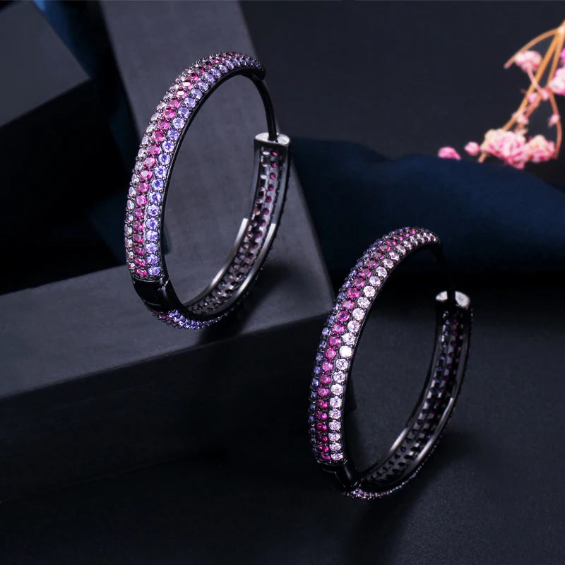 S&S Rainbow Double-Sided CZ Huggie Hoop Earrings – Gold & Black Gun Plated – Collection