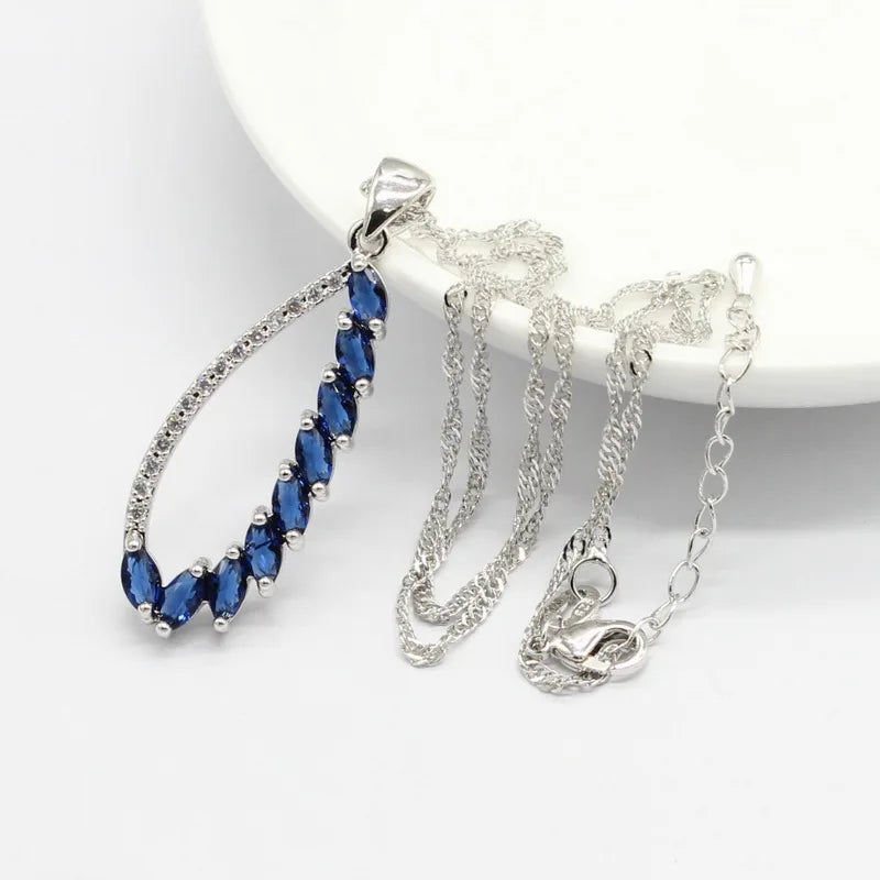XOTICA Silver Jewelry Set for Women Blue White Crystal Earrings Necklace Pendant for Wedding Parties Gifts Engagements Featuring Zircon