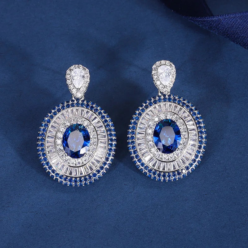 Gemfiori New Luxury Vintage Timeless Triple Layer Halo Design Jewelry Set for Women Oval Cut Blue Gem Halo Pendant Necklace Earrings Ring