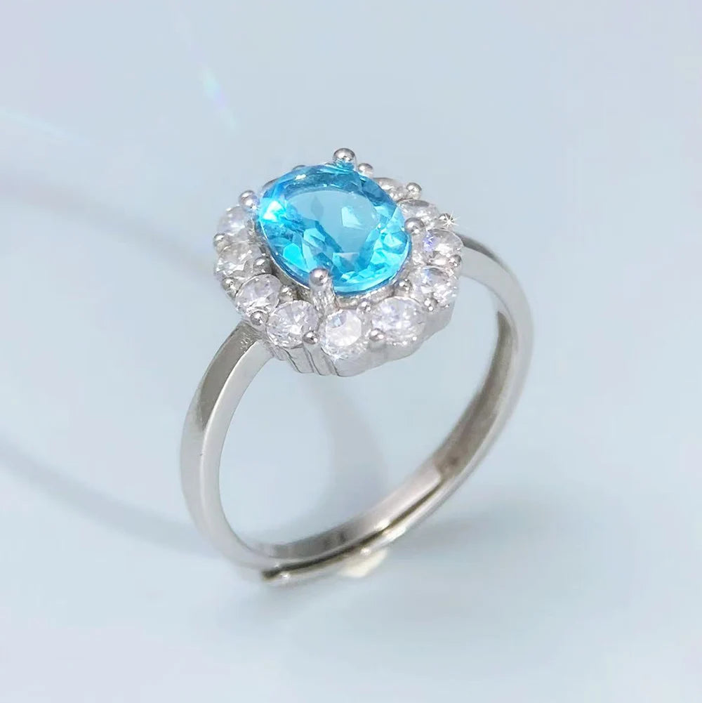 S&S Natural Swiss Blue Topaz Ring – 925 Sterling Silver – CZ Halo – Rhodium Plated – Collection
