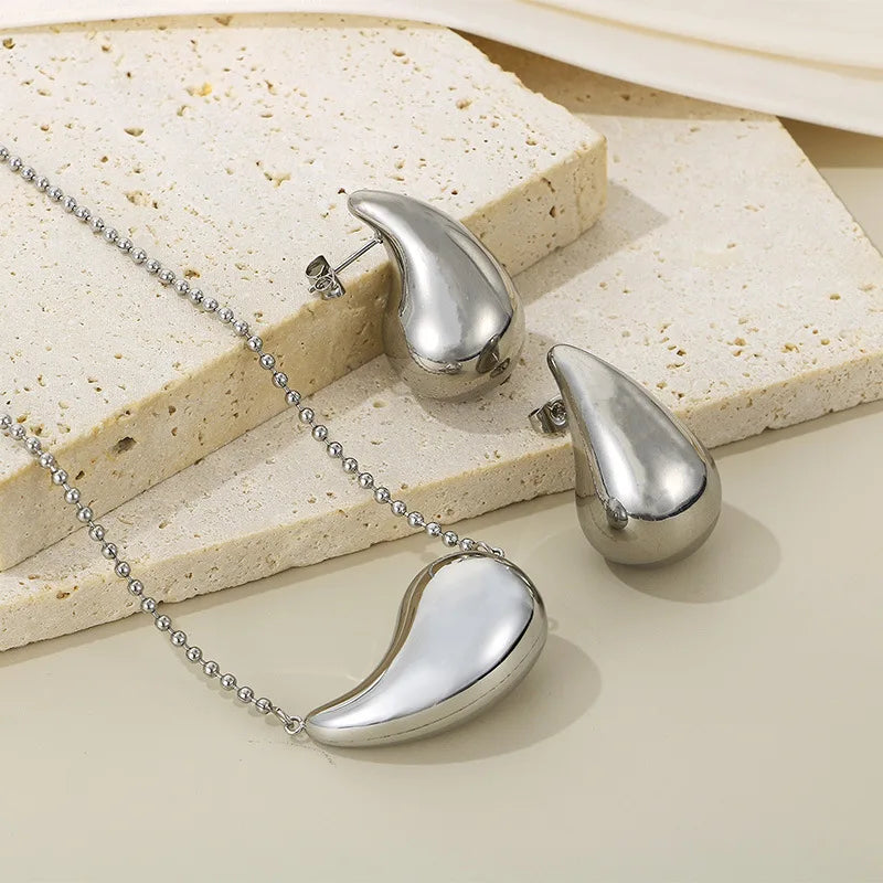 REBEL High-quality Fashion Chubby Water Drop Stainless Steel Hollow Earrings Necklace Charm Temperament Jewelry Set