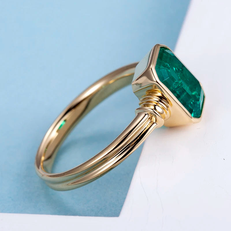 Gemfiori Messi Jewelry MSR-770 18k Yellow Gold Bezel Setting Lab Grown Emerald Engagement Ring