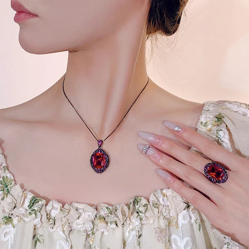 REDheart Fashion Women's Copper Inlaid Zircon Plated Black Gold Anniversary Activity Opening Ring Imitation Leaf Red Corundum Pendant Set