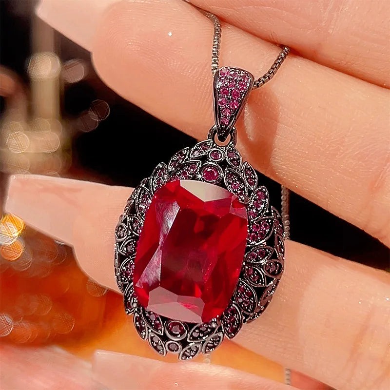 REDheart Fashion Women's Copper Inlaid Zircon Plated Black Gold Anniversary Activity Opening Ring Imitation Leaf Red Corundum Pendant Set