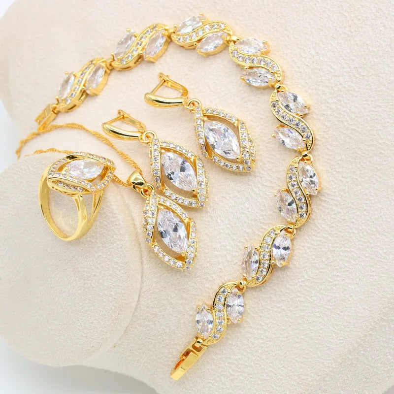 XOTICA Geometric Gold Jewelry Set for Women 18k Gold Plated Bracelet Earrings Necklace Pendant Ring for Engagement and Weddings