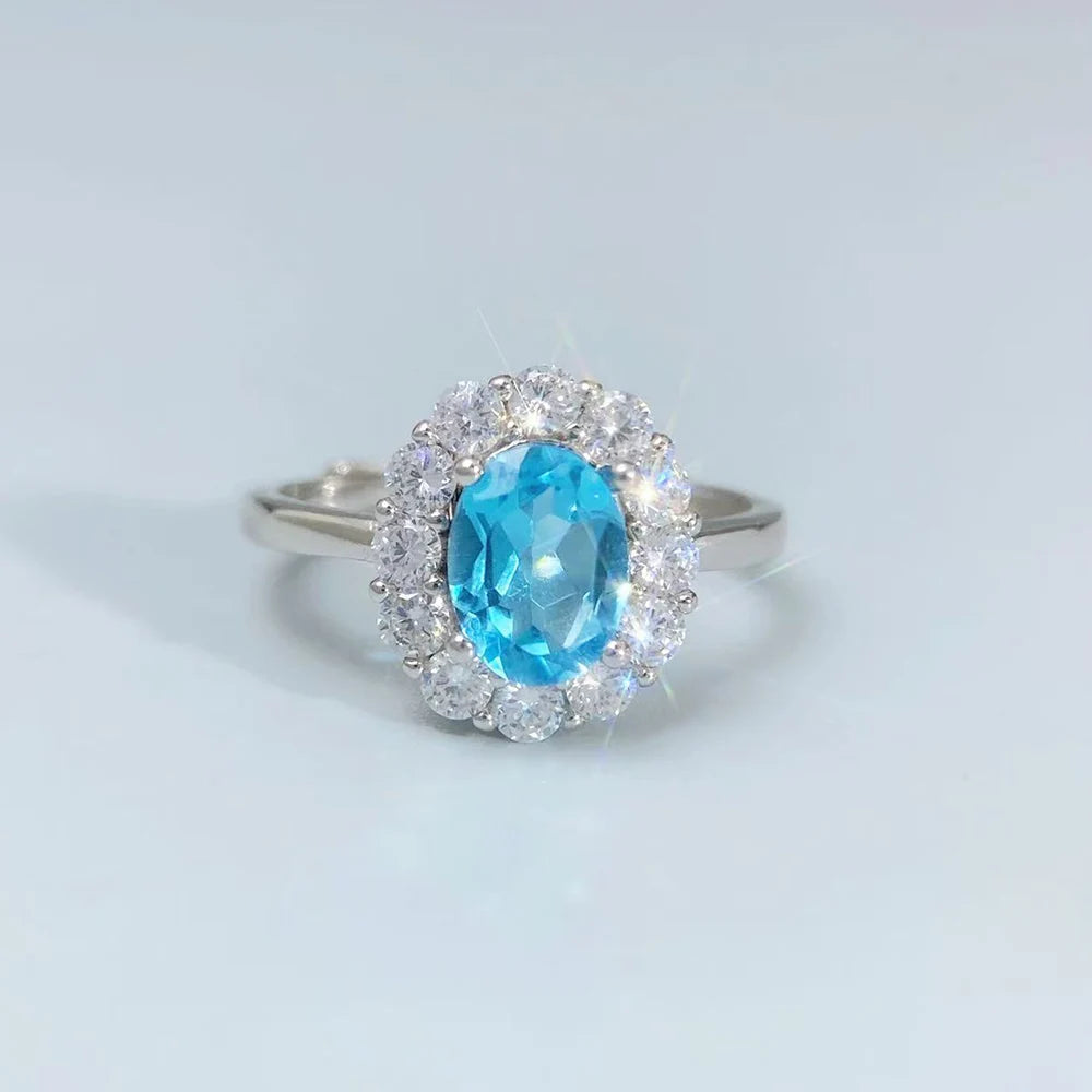 S&S Natural Swiss Blue Topaz Ring – 925 Sterling Silver – CZ Halo – Rhodium Plated – Collection