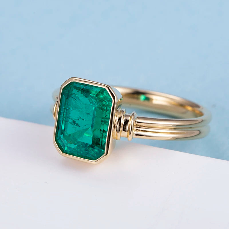 Gemfiori Messi Jewelry MSR-770 18k Yellow Gold Bezel Setting Lab Grown Emerald Engagement Ring