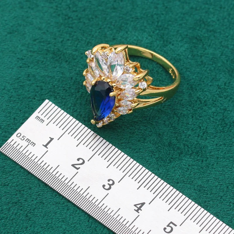 XOTICA Yellow Gold Plated Jewelry Set Women Wedding Sapphire Water Drop Trendy Blue White Crystal Claw Setting Bracelet Earrings