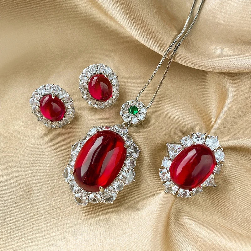 Gemfiori Luxury Pigeon Blood Ruby Jewelry Set Cabochon Cut Red Gem Halo Pendant Necklaces Earrings Rings Timeless Elegant Emerald Wedding