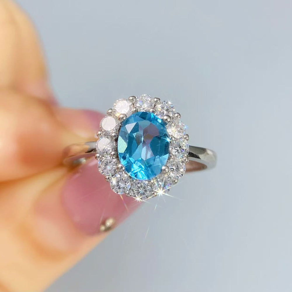 S&S Natural Swiss Blue Topaz Ring – 925 Sterling Silver – CZ Halo – Rhodium Plated – Collection