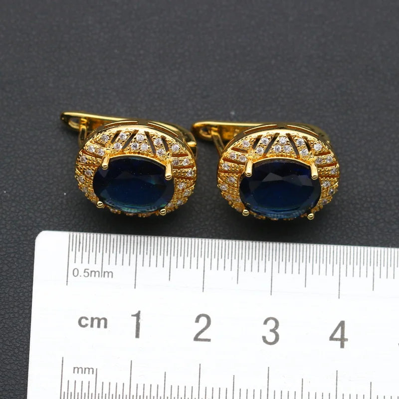 XOTICA Gold Plated Jewelry Set for Women Custom Blue Crystal Earrings Pendant Ring Necklace for Weddings and Parties