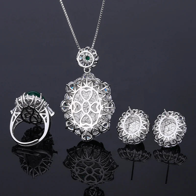 Gemfiori Luxury Pigeon Blood Ruby Jewelry Set Cabochon Cut Red Gem Halo Pendant Necklaces Earrings Rings Timeless Elegant Emerald Wedding