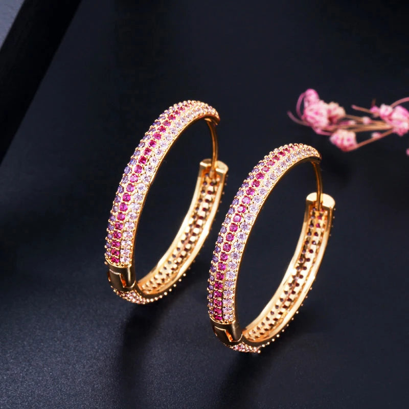 S&S Rainbow Double-Sided CZ Huggie Hoop Earrings – Gold & Black Gun Plated – Collection