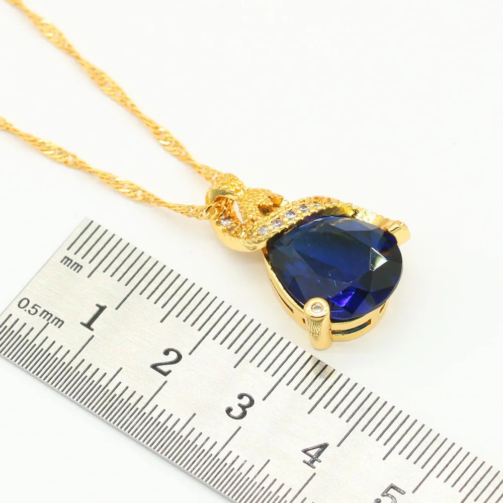 XOTICA Women's Gold Plated Bridal Sets Sapphire Blue Classic Alloy Stud Earrings Bracelet Pendant Necklace Ring for Engagement Wedding