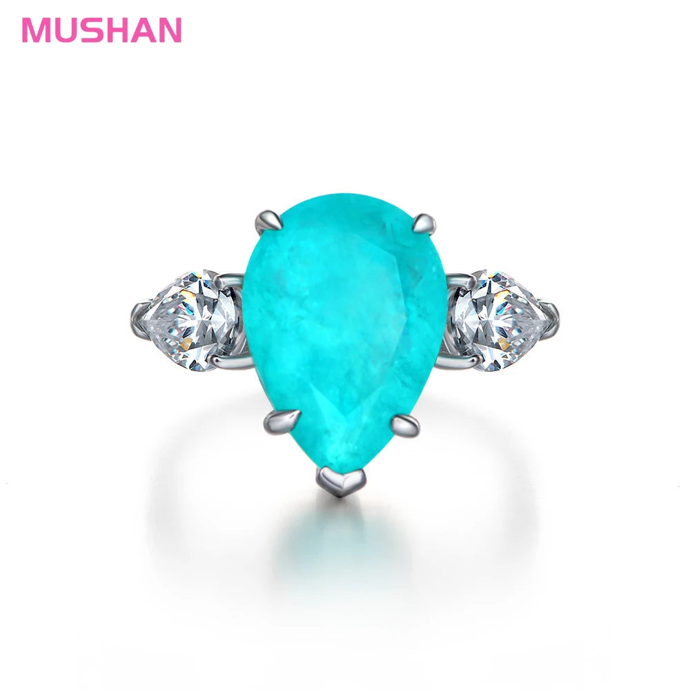 MUSHAN 925 Sterling Silver Luxury Pave Setting CMA Certified Waterdrop Zircon Wedding Party Rings Synthetic Paraiba 6ct Blue