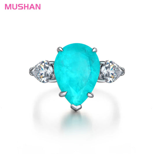 MUSHAN 925 Sterling Silver Luxury Pave Setting CMA Certified Waterdrop Zircon Wedding Party Rings Synthetic Paraiba 6ct Blue