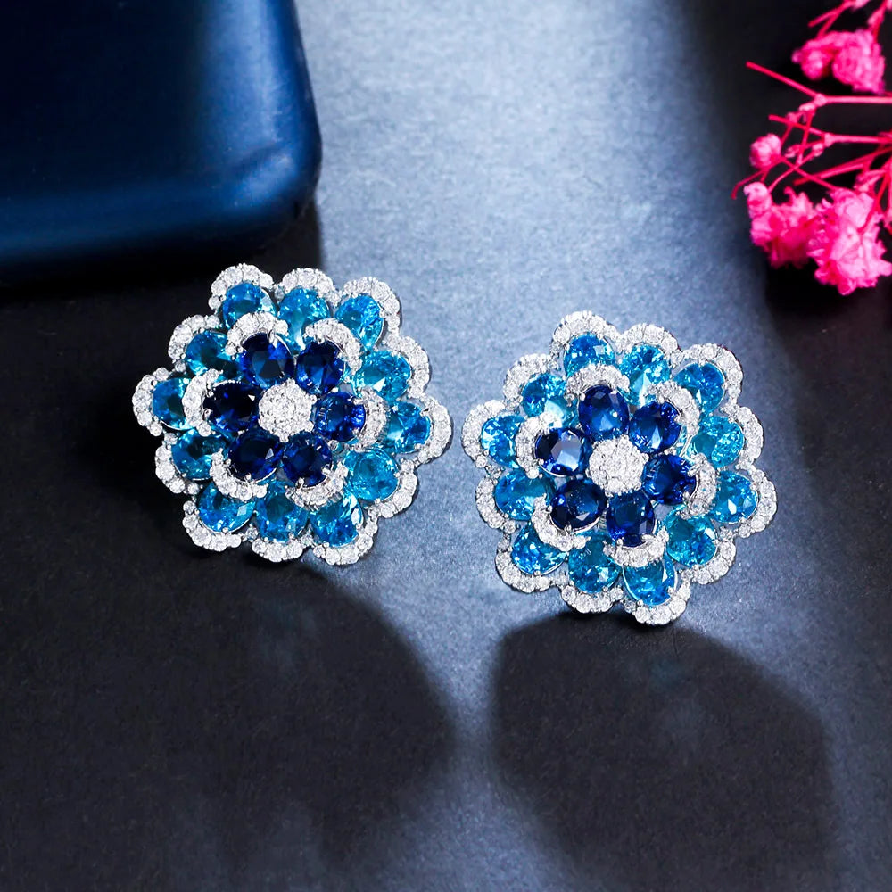S&S Blue CZ 3D Flower Full Pavé Stud Earrings – Rhodium & 18K Gold Plated – Collection