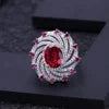 ArtistA Deluxe Unique Halo Design Iced Out 925 Silver Big Gemstone Synthetic Ruby Sunflower Cocktail Ring Pendant Earrings Jewelry Set