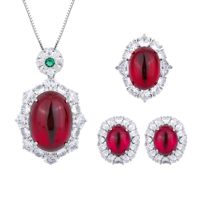 Gemfiori Luxury Pigeon Blood Ruby Jewelry Set Cabochon Cut Red Gem Halo Pendant Necklaces Earrings Rings Timeless Elegant Emerald Wedding