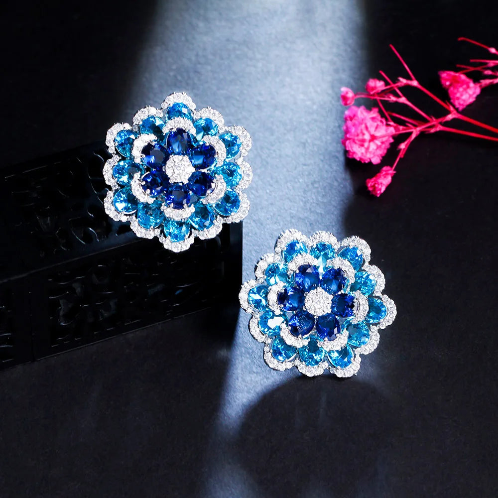 S&S Blue CZ 3D Flower Full Pavé Stud Earrings – Rhodium & 18K Gold Plated – Collection