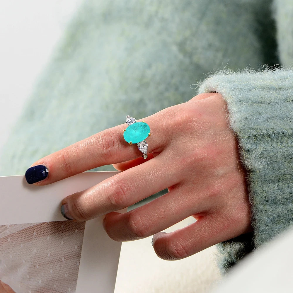MuShan Jewelry Factory Blue Green Synthetic Paraiba 10*14 Ring in 5 Carat Silver Oval Shape Is Selling Well