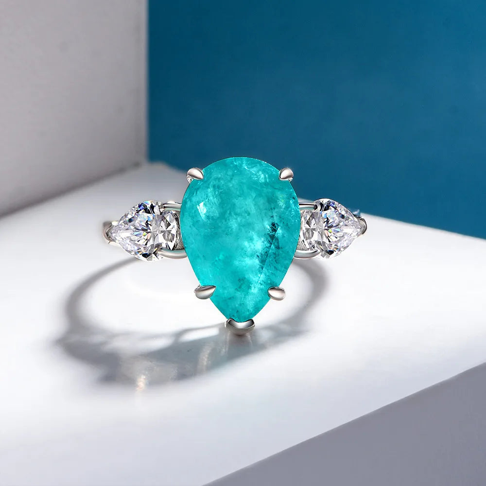MuShan Jewelry Factory New Style of 10*14 Synthetic Paraiba Ring With Silver Plating and White Gold 6 Carats