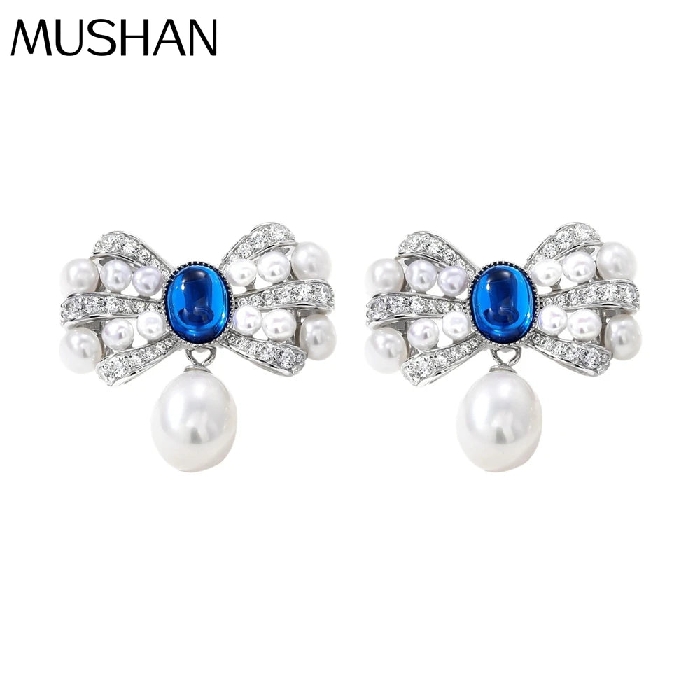 MUSHAN Jewelry Factory S925 Natural Pearl Stud Earrings Light Luxury and High End Bow Ear Accessory Cross Border Bestseller