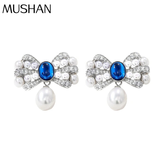MUSHAN Jewelry Factory S925 Natural Pearl Stud Earrings Light Luxury and High End Bow Ear Accessory Cross Border Bestseller