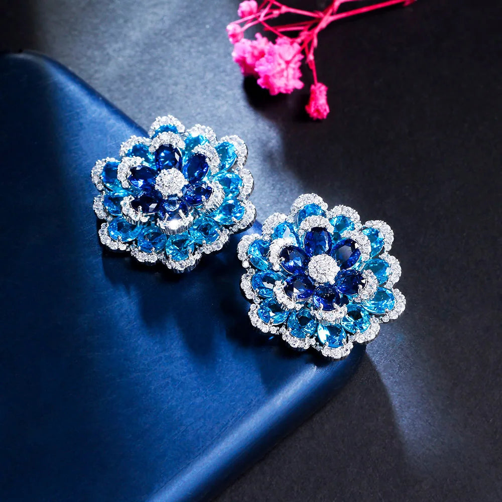 S&S Blue CZ 3D Flower Full Pavé Stud Earrings – Rhodium & 18K Gold Plated – Collection