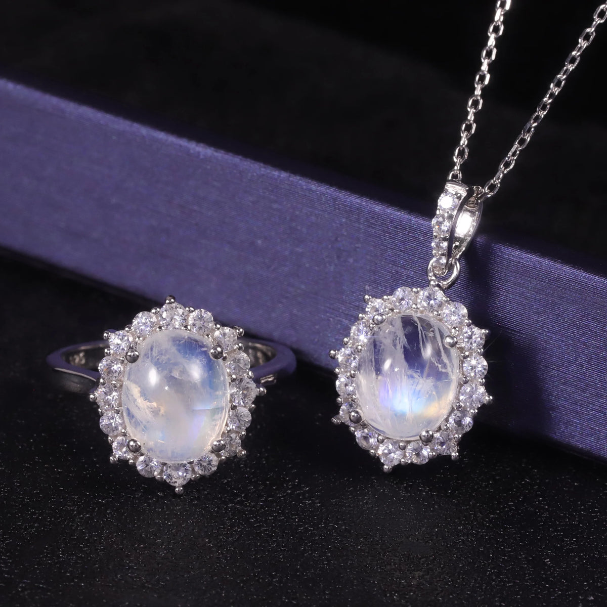 ArtistA Abiding 925 Sterling Silver White Cz Halo Oval Cut 8X10mm Milky Blue Moonstone Cluster Flower Ring Necklace Pendant Jewelry Set