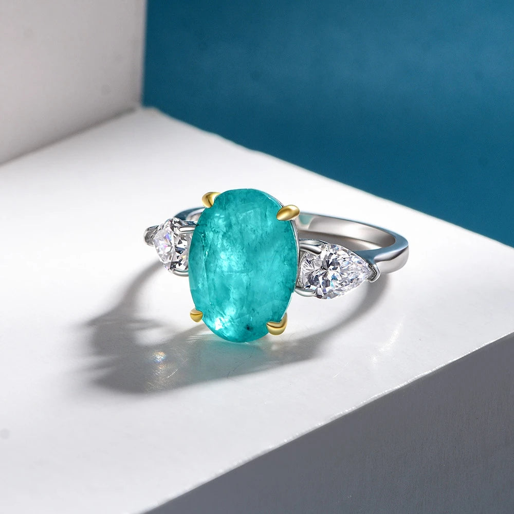 MuShan Jewelry Factory Blue Green Synthetic Paraiba 10*14 Ring in 5 Carat Silver Oval Shape Is Selling Well