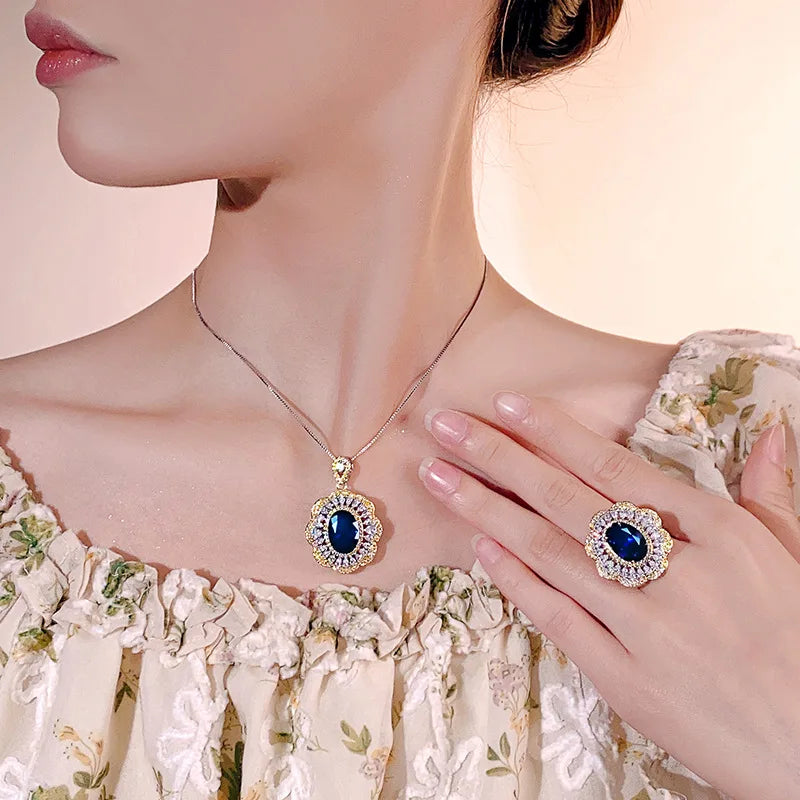 REDheart Brass Zircon Gold-Plated Wavy Open Ring Simulation Blue Pointed Crystal Niche Trendy Engagement Party Pendant Necklace Set