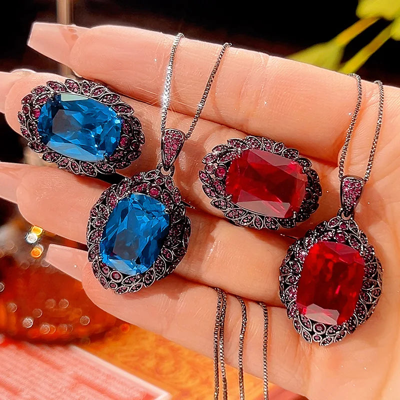 REDheart Fashion Women's Copper Inlaid Zircon Plated Black Gold Anniversary Activity Opening Ring Imitation Leaf Red Corundum Pendant Set