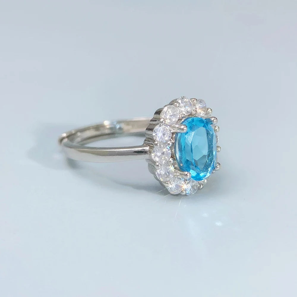 S&S Natural Swiss Blue Topaz Ring – 925 Sterling Silver – CZ Halo – Rhodium Plated – Collection