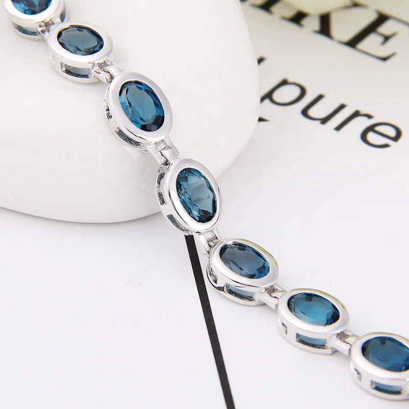 ArtistA Guangzhou Jewelry Factory 925 Sterling Silver Natural London Blue Topaz Gemstone Oval Tennis Bracelets for Women
