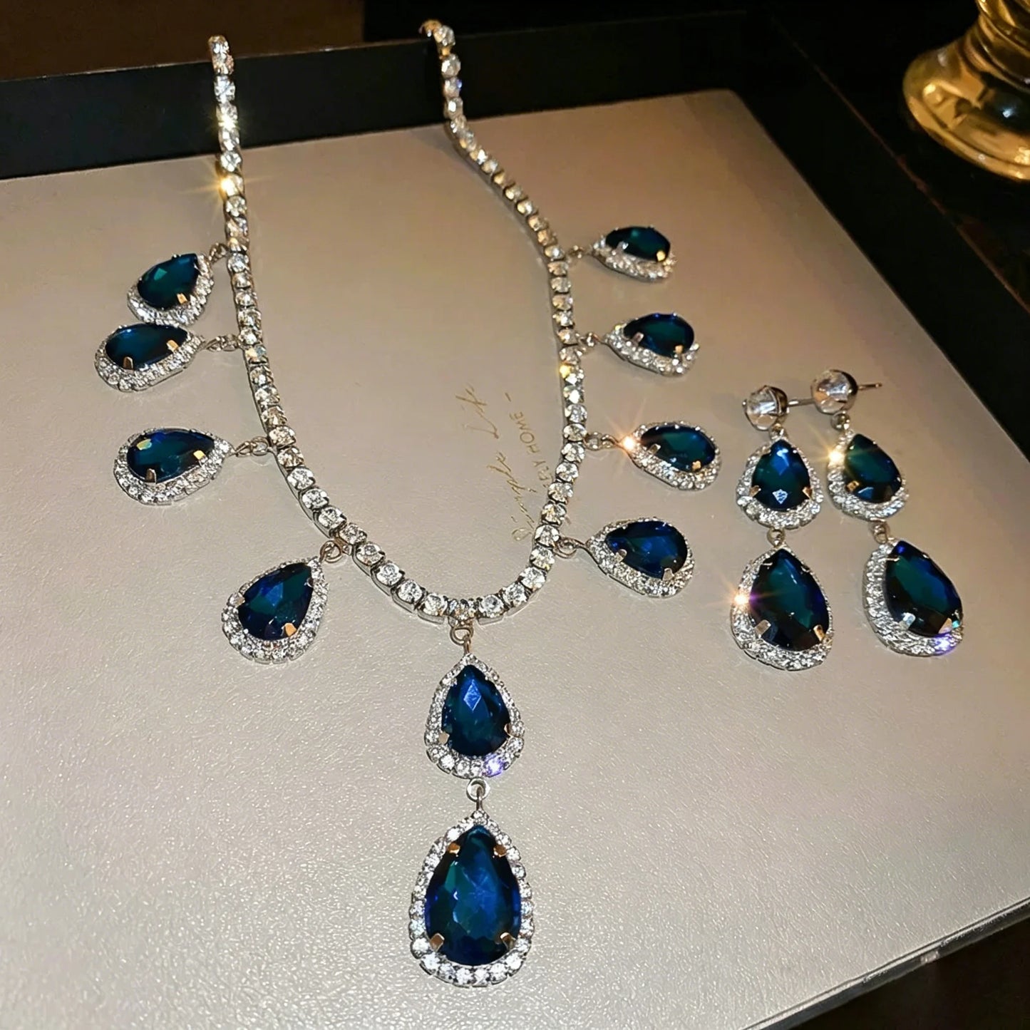 XM S384 Silver Plated Peacock Blue Zircon Halo Teardrop Pendant Necklace & Drop Earrings Set