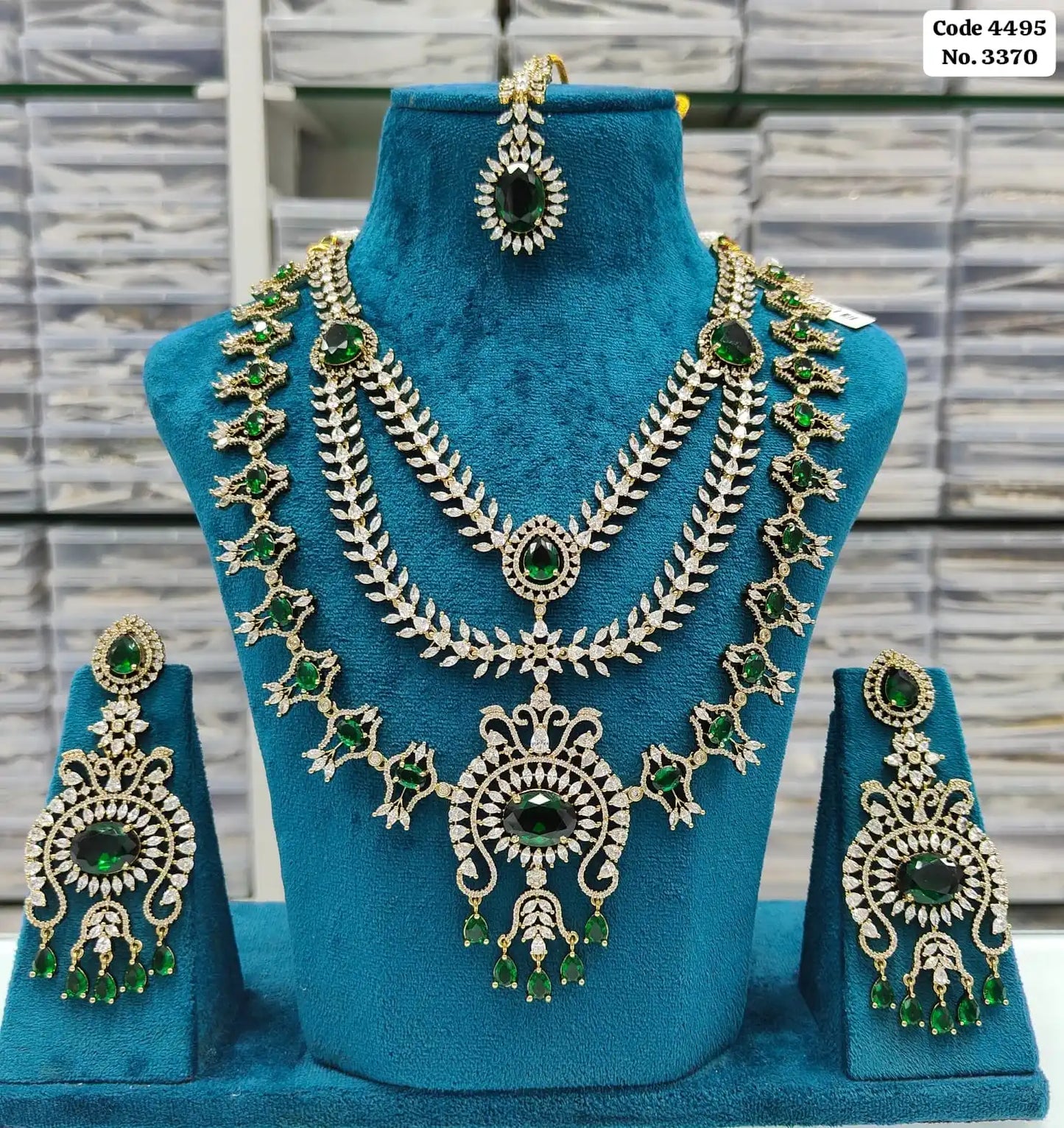 Elegant Emerald Green & AD Accented Layered Bridal Necklace Set with Earrings & Maang Tikka Jewellery Set