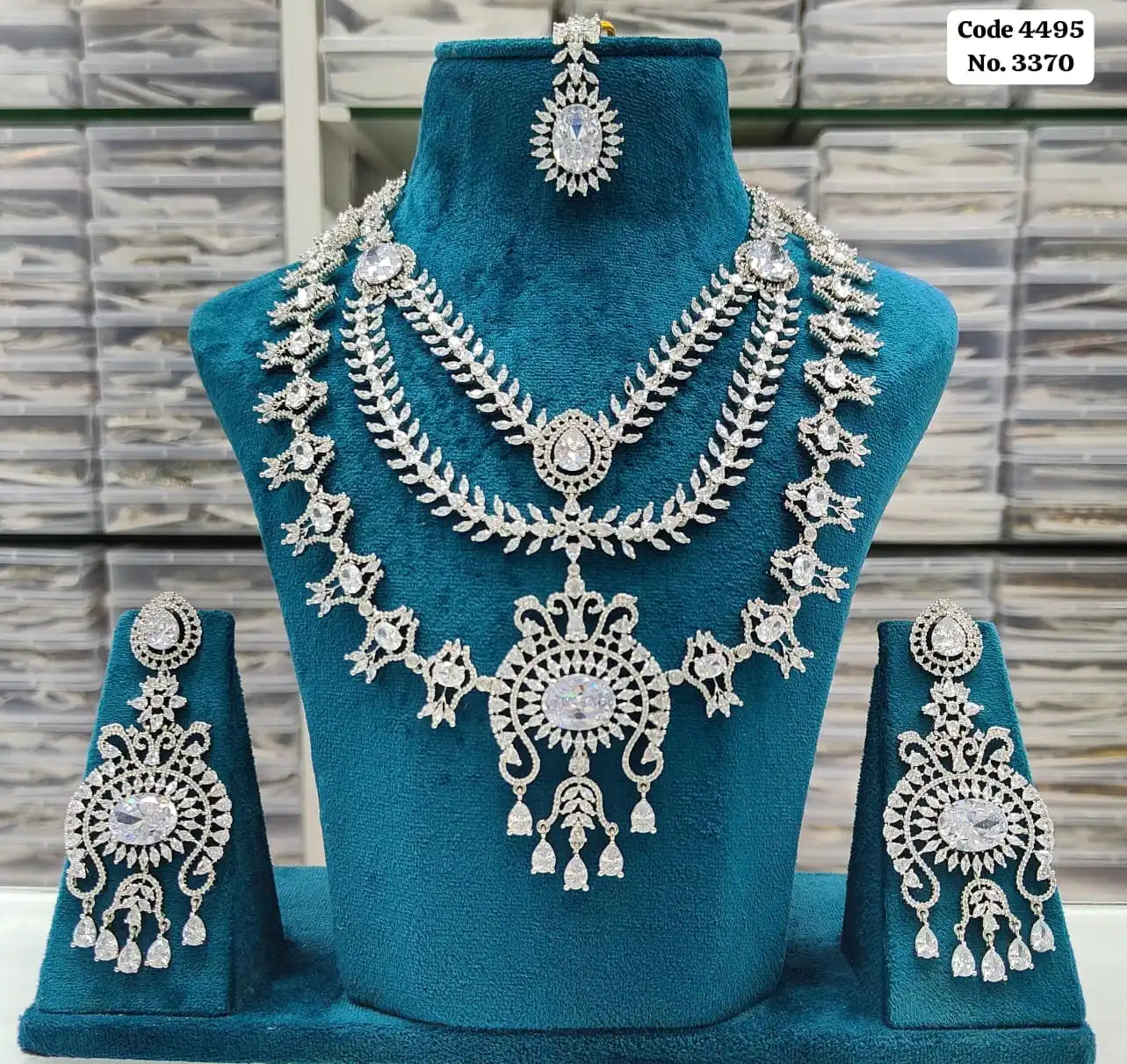 Elegant Emerald Green & AD Accented Layered Bridal Necklace Set with Earrings & Maang Tikka Jewellery Set