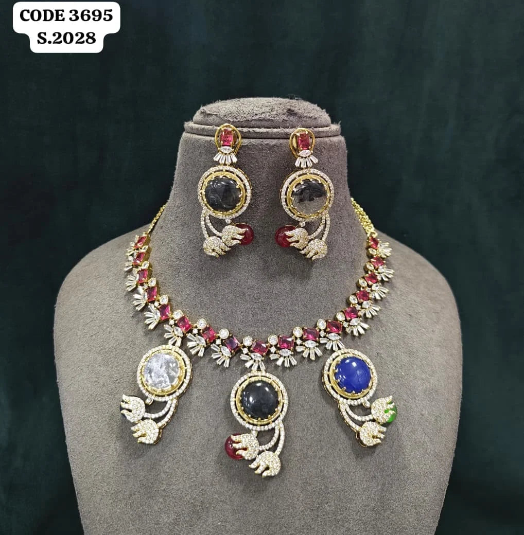 Luxury Designer Brass Necklace Set with Blue Round Stone, Green Accents, Gold Plated Party Wedding Jewellery Collection Set