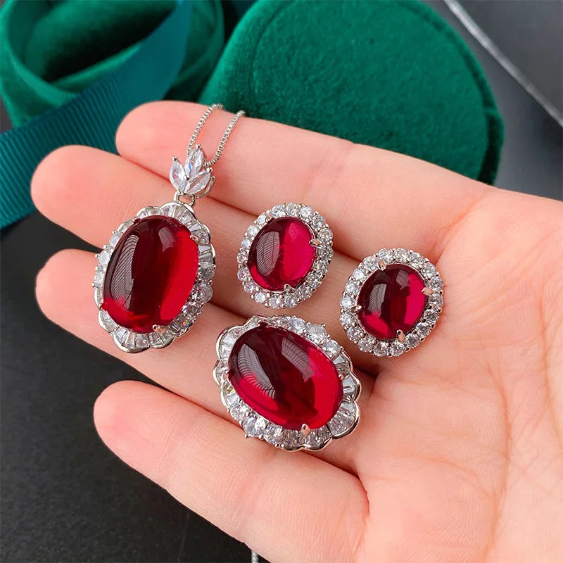 Gemfiori Luxury Pigeon Blood Ruby Jewelry Set Cabochon Cut Red Gem Halo Pendant Necklaces Earring Rings Timeless Classic Elegant Wedding