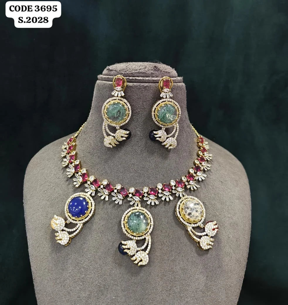 Luxury Designer Brass Necklace Set with Blue Round Stone, Green Accents, Gold Plated Party Wedding Jewellery Collection Set