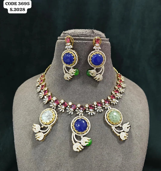 Lakshmi Luxury Designer Brass Necklace Set with Blue Round Stone, Green Accents, Gold Plated Party Wedding Jewellery Collection Set