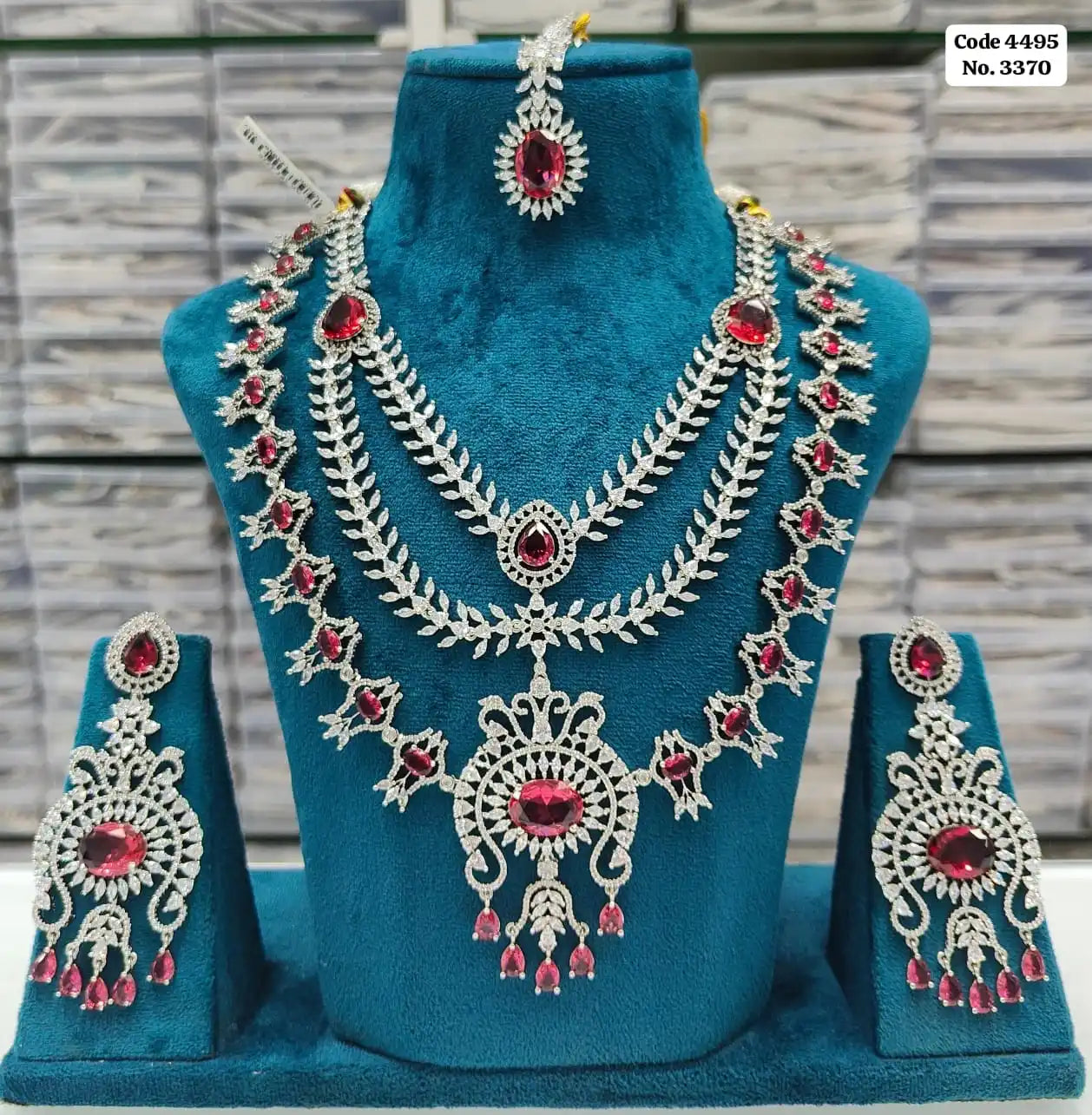 Elegant Emerald Green & AD Accented Layered Bridal Necklace Set with Earrings & Maang Tikka Jewellery Set