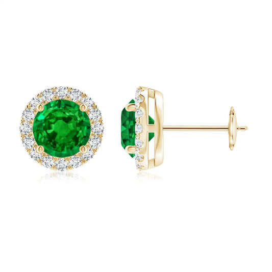 Classic round emerald halo design with brilliant diamond surround, four-prong setting and elegant 14kt yellow gold finish