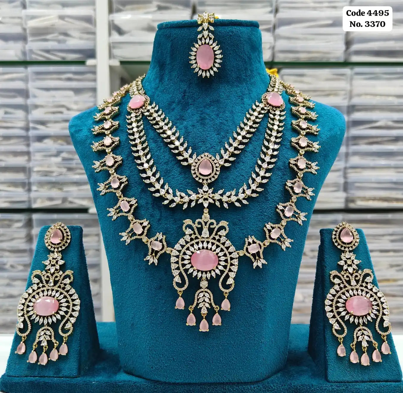 Elegant Emerald Green & AD Accented Layered Bridal Necklace Set with Earrings & Maang Tikka Jewellery Set
