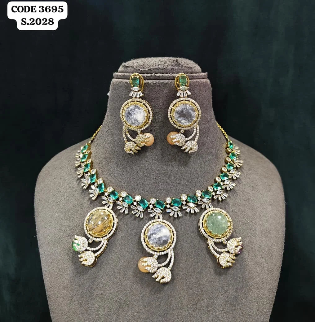 Luxury Designer Brass Necklace Set with Blue Round Stone, Green Accents, Gold Plated Party Wedding Jewellery Collection Set